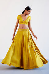 Natasha Luthra in Mustard Yellow Embroidered Cotton Silk Satin Lehenga Set