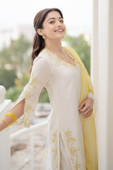 Rashmika Mandanna in Ivory Yellow Chanderi Kurta Set with Cutwork Embroidery