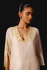 Rashmika Mandanna in Ivory Yellow Chanderi Kurta Set with Cutwork Embroidery