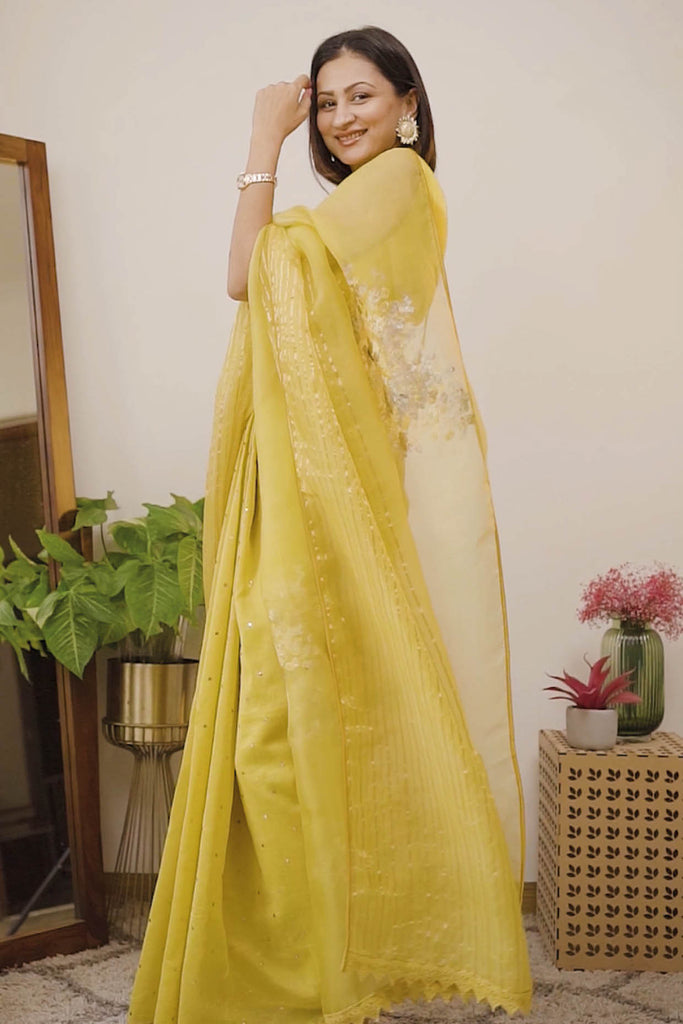 Sukhneet Wadhwa Gujral in Mustard Hand-Painted Organza Saree