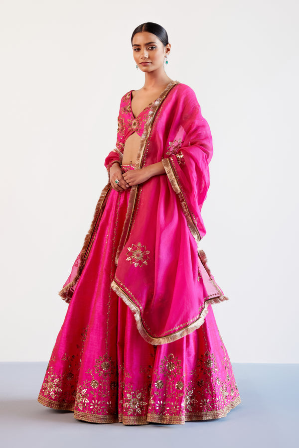 Sara Ali Khan in Fuchsia Pink Hand Embroidered Raw Silk Lehenga Set