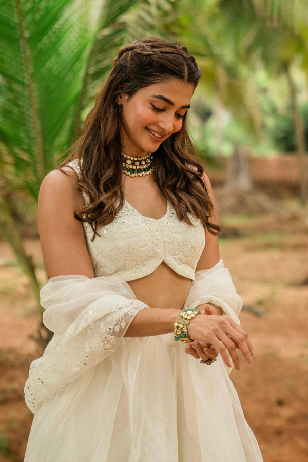 Pooja Hegde in Ivory Embroidered Silk Chanderi Lehenga Set