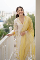 Rashmika Mandanna in Ivory Yellow Chanderi Kurta Set with Cutwork Embroidery
