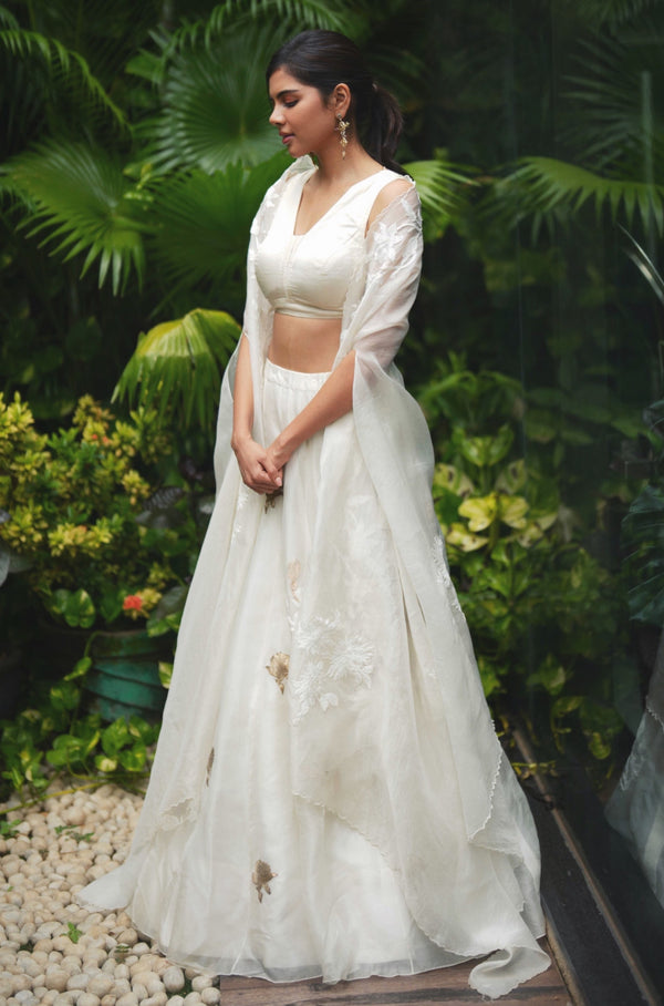 Kalyani Priyadarshan in Ivory Silk Organza Cape Lehenga Set