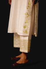 Rashmika Mandanna in Ivory Yellow Chanderi Kurta Set with Cutwork Embroidery