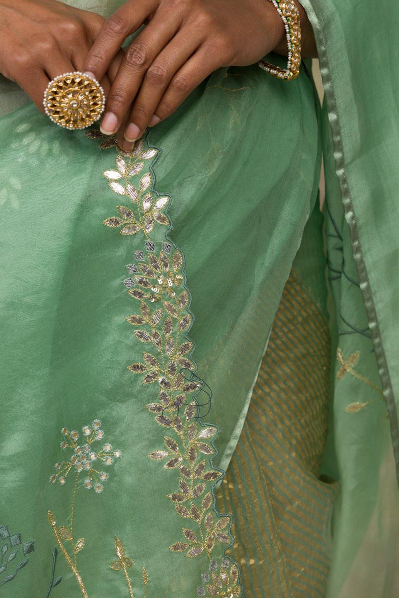 Green Silk Organza Woven Zari Saree