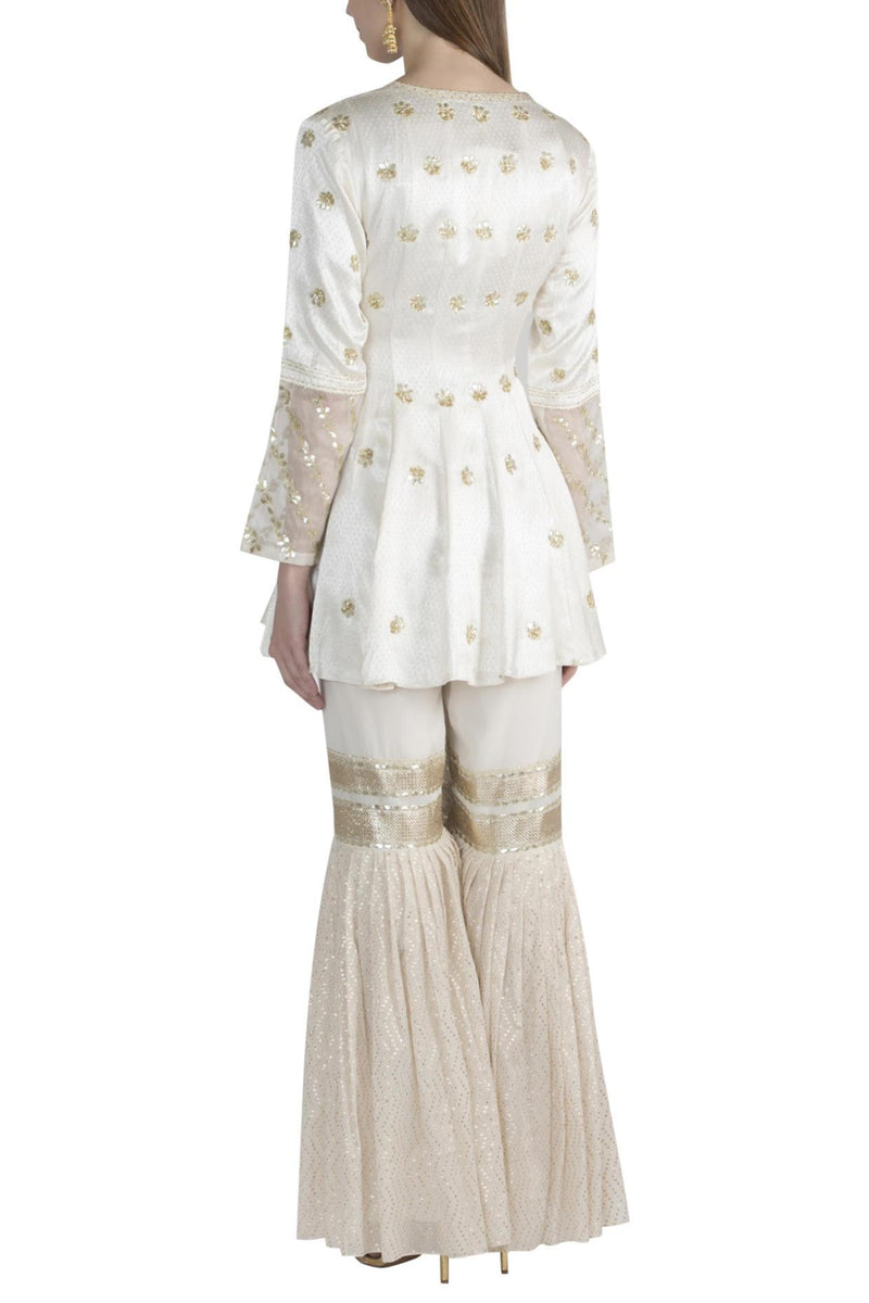 Shivani Raina in Ivory Kurta And Sharara With Saffron Dupatta